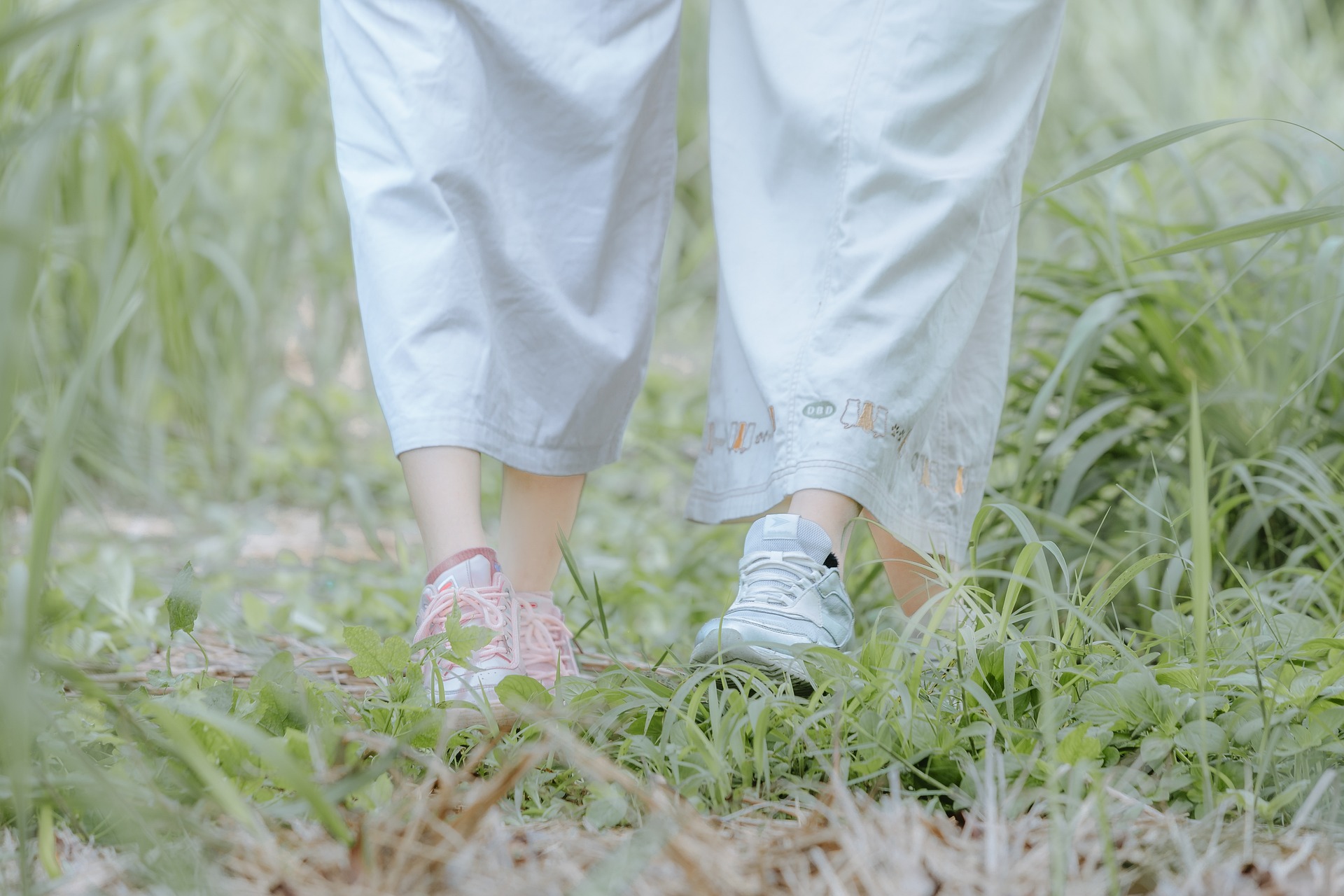 two girls walking outside