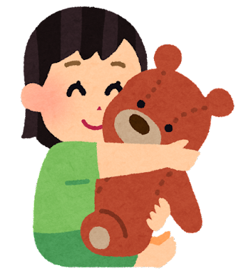 child hugging a bear